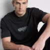 T-Shirt mit Aufdruck auf der Rückseite T-Shirt mit Aufdruck auf der Rückseite