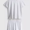 T-Shirt- und Shorts-Schlafanzug T-Shirt- und Shorts-Schlafanzug