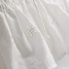 The Primark Scene | Kurzes Top aus Baumwolle mit Lochstickerei und Rüschen