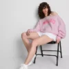 The Primark Scene | Sweatshirt mit Slogan und schulterfreiem Ausschnitt The Primark Scene | Sweatshirt mit Slogan und schulterfreiem Ausschnitt