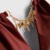 Triangel-Bikini-Oberteil mit Kettenverzierung Triangel-Bikini-Oberteil mit Kettenverzierung