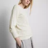 Unverzichtbare Strickjacke mit Rundhalsausschnitt Unverzichtbare Strickjacke mit Rundhalsausschnitt