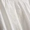 Weit geschnittene Hose aus Baumwolle mit Stickerei Weit geschnittene Hose aus Baumwolle mit Stickerei