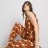 Weit geschnittene Hose mit Aufdruck Weit geschnittene Hose mit Aufdruck