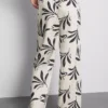 Weit geschnittene Hose mit Aufdruck Weit geschnittene Hose mit Aufdruck