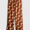 Weit geschnittene Hose mit Aufdruck Weit geschnittene Hose mit Aufdruck