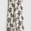 Weit geschnittene Hose mit Aufdruck Weit geschnittene Hose mit Aufdruck