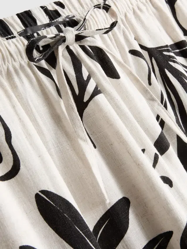 Weit geschnittene Hose mit Aufdruck Weit geschnittene Hose mit Aufdruck