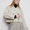 Zweireihige, kastenförmige Regenjacke Zweireihige, kastenförmige Regenjacke