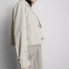 Zweireihige, kastenförmige Regenjacke Zweireihige, kastenförmige Regenjacke