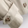 Zweireihige, kastenförmige Regenjacke Zweireihige, kastenförmige Regenjacke
