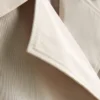 Zweireihige, kastenförmige Regenjacke Zweireihige, kastenförmige Regenjacke